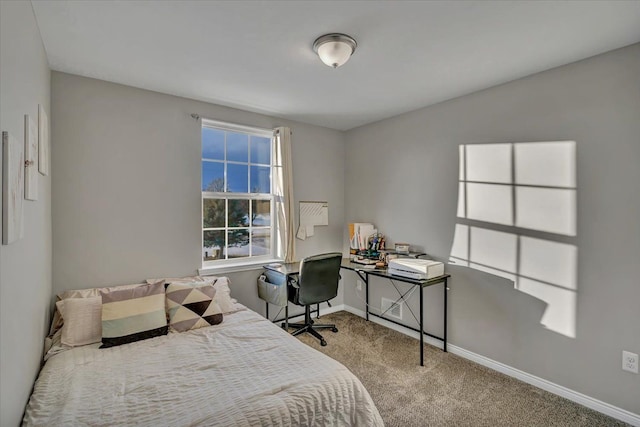 bedroom featuring light carpet