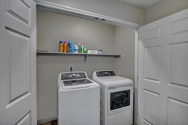 laundry room with washer and clothes dryer