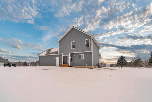 view of snow covered property