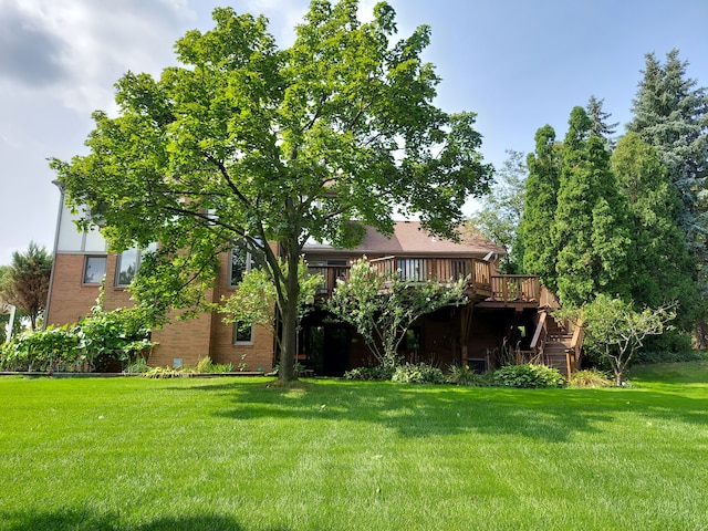 view of yard featuring a deck