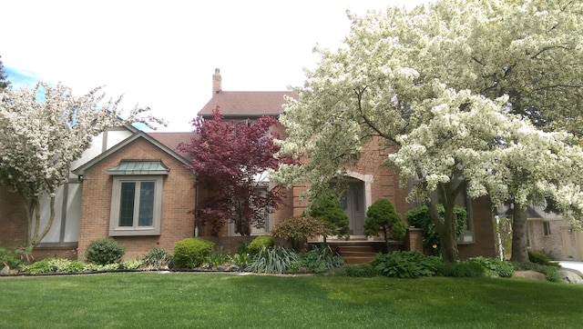 exterior space with a front yard