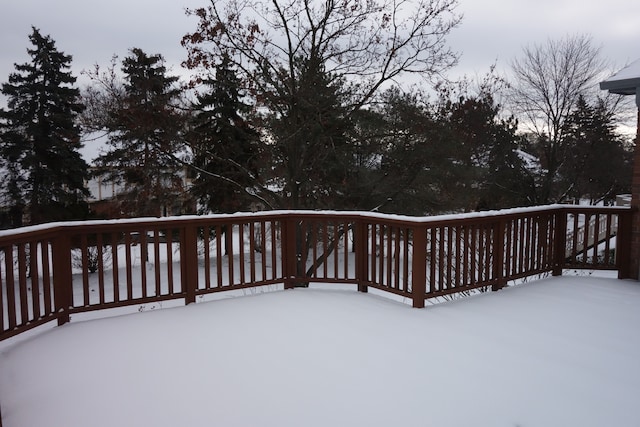 view of snow covered deck