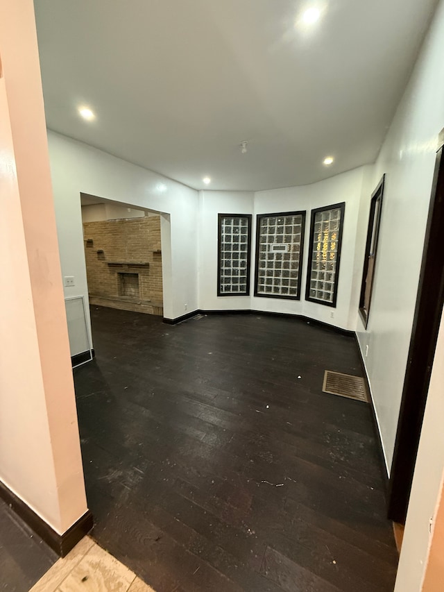 unfurnished room featuring hardwood / wood-style floors