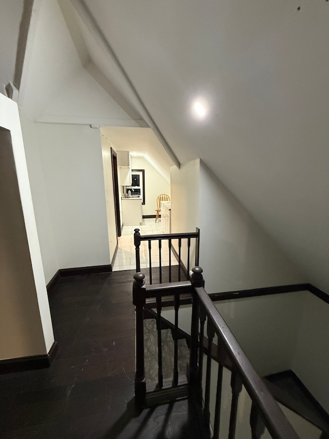 stairs with wood-type flooring