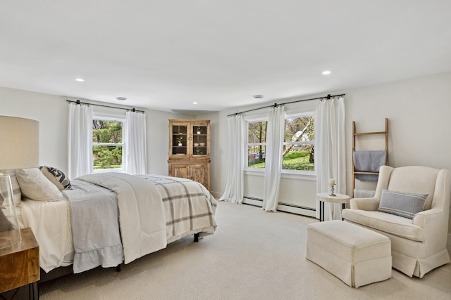 101 Carl Dr NE, Ada, MI 49301 - carpeted bedroom with recessed lighting and a baseboard heating unit