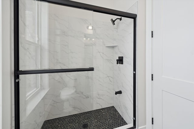 bathroom with an enclosed shower