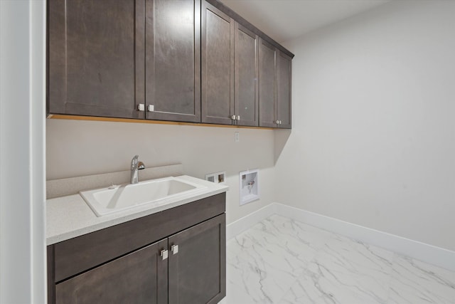 laundry room featuring cabinets, hookup for a washing machine, sink, and electric dryer hookup