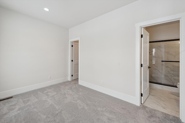 unfurnished bedroom with light carpet