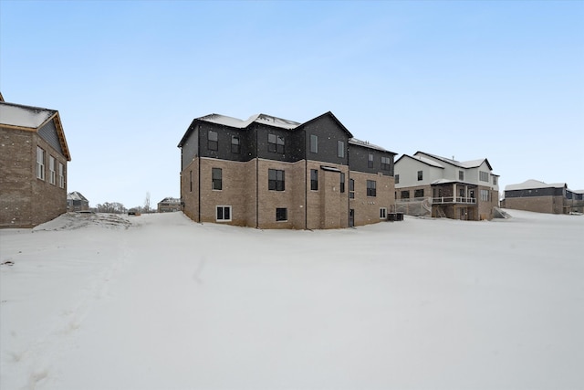 view of snow covered house