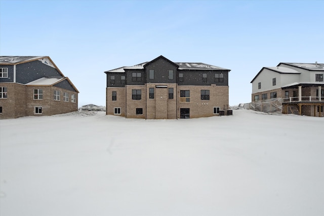 view of snow covered property