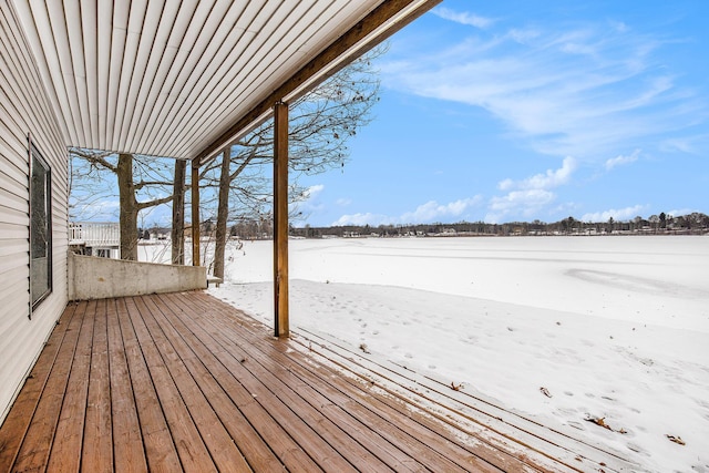 view of snow covered deck
