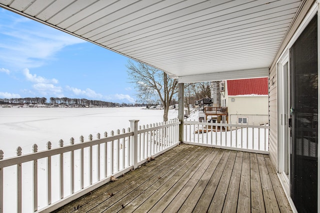 view of snow covered deck