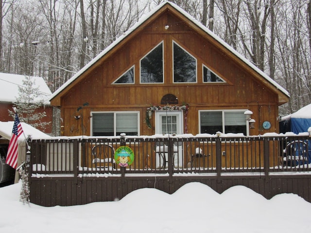 view of snow covered house