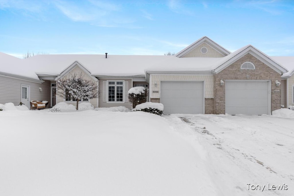 single story home featuring a garage