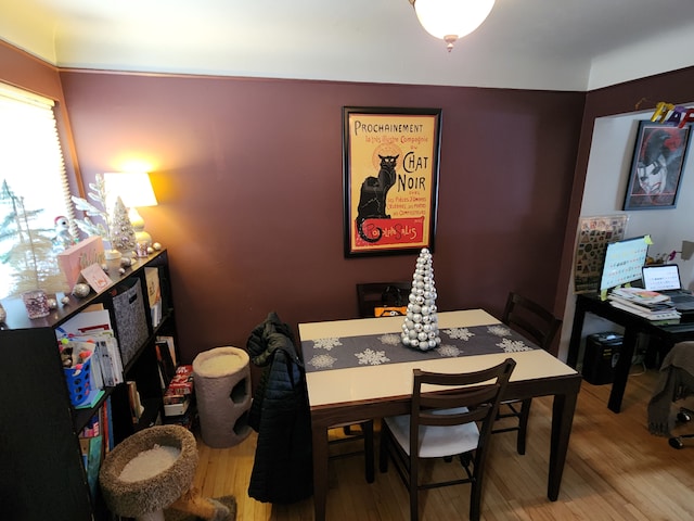 dining area featuring hardwood / wood-style floors