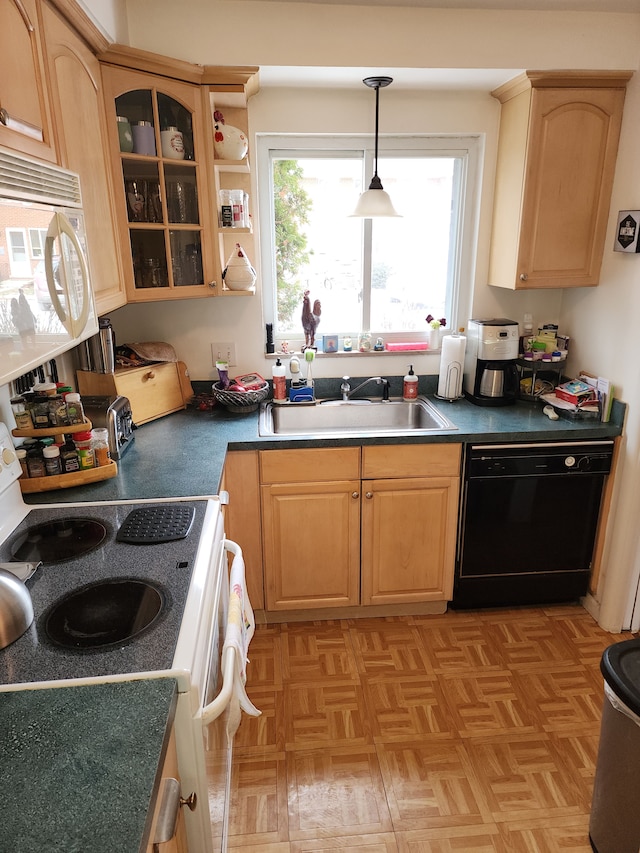 kitchen featuring sink, hanging light fixtures, light parquet flooring, light brown cabinets, and white appliances