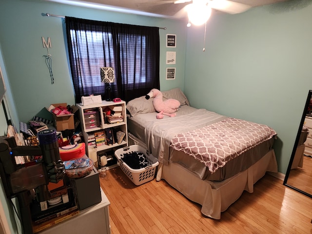 bedroom featuring ceiling fan and light wood-type flooring