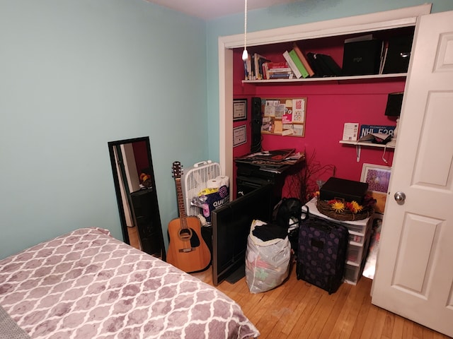 bedroom featuring hardwood / wood-style flooring