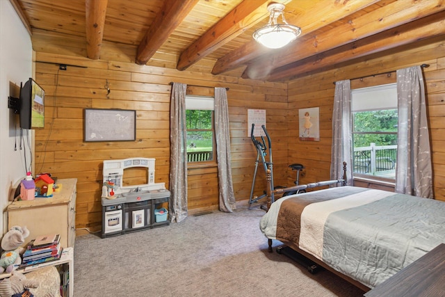 carpeted bedroom featuring wood ceiling, beam ceiling, and wood walls