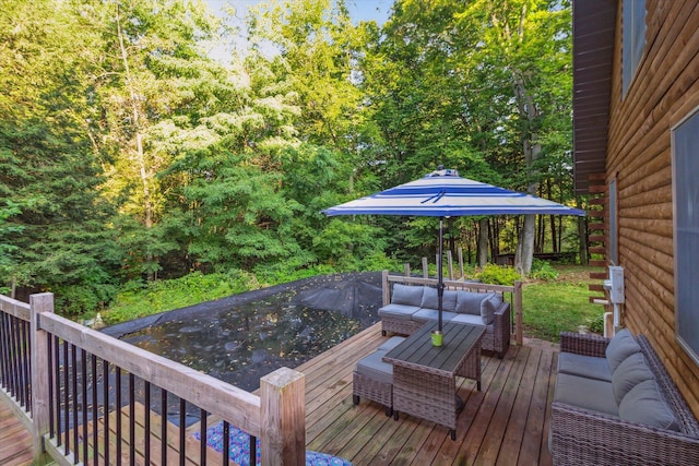 deck featuring outdoor lounge area