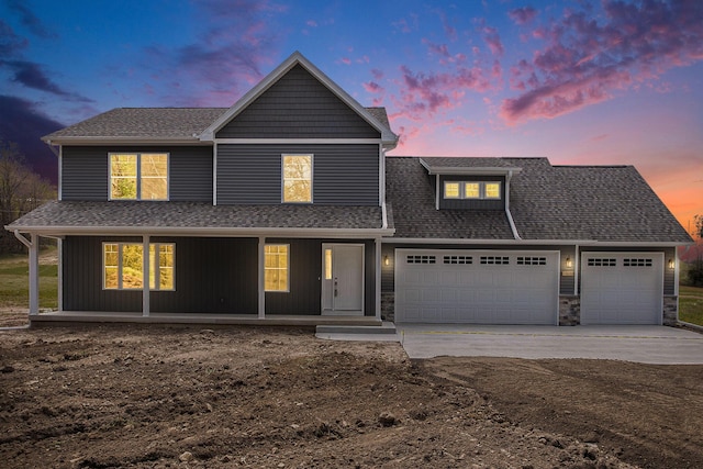 view of front of home with a garage