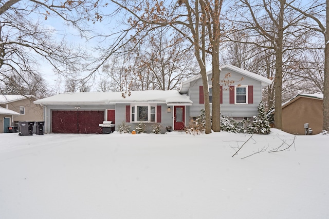 split level home featuring a garage