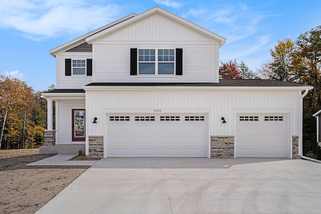 front of property featuring a garage