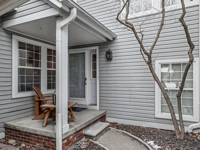 entrance to property with a porch