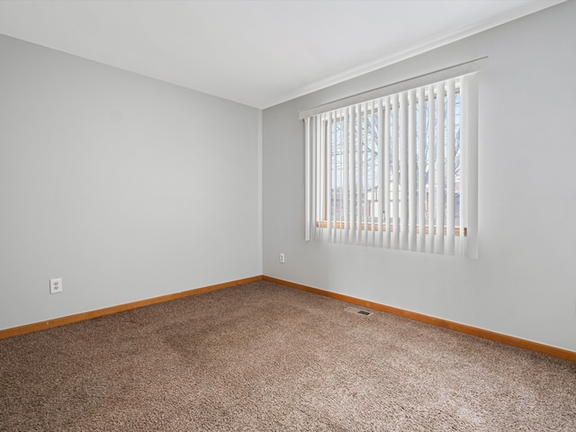 view of carpeted spare room