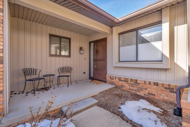 property entrance with a patio area