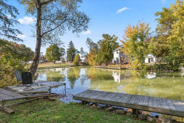 view of dock with a water view