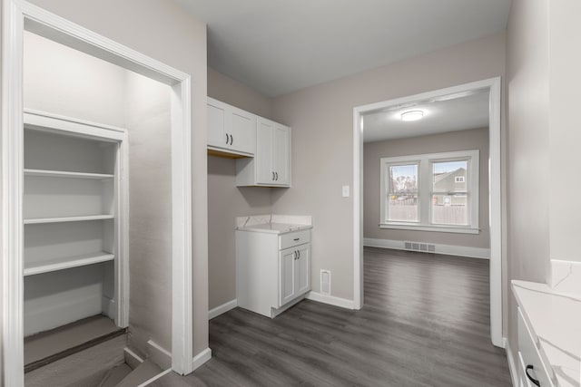 washroom featuring dark hardwood / wood-style flooring