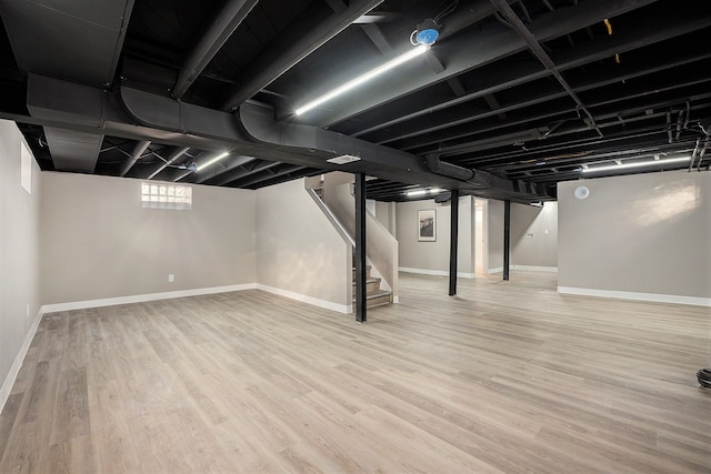 basement with light wood-type flooring