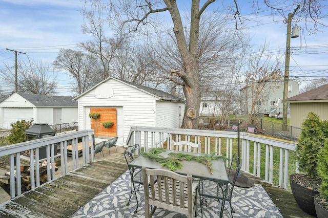 deck with an outbuilding and grilling area