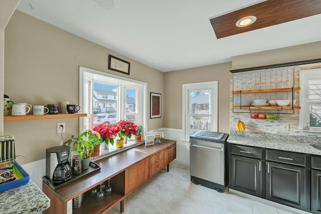 kitchen featuring light stone counters