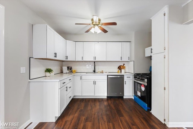 kitchen with dark hardwood / wood-style floors, tasteful backsplash, white cabinets, range with gas cooktop, and stainless steel dishwasher