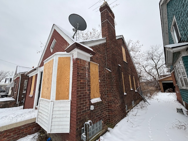 view of snow covered property