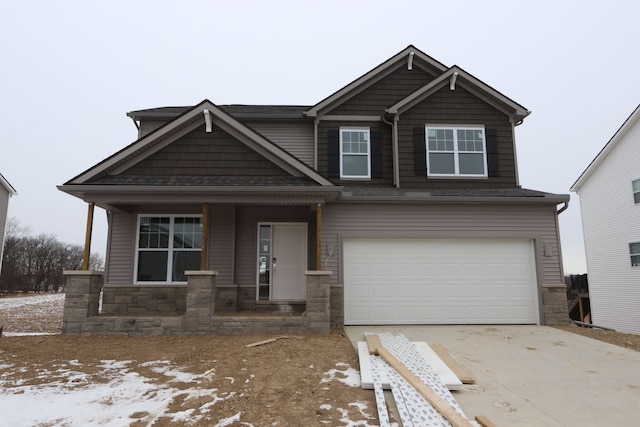 craftsman-style house featuring a garage