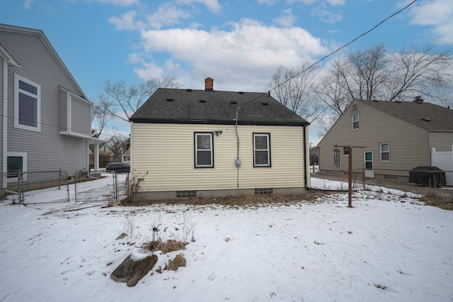 view of snow covered house