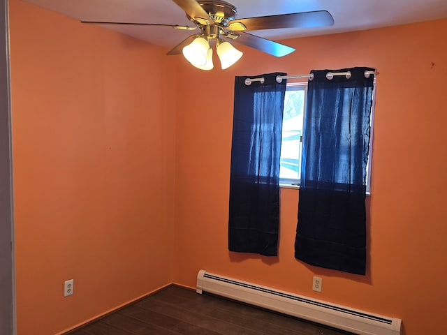 unfurnished room with a baseboard radiator, ceiling fan, and dark hardwood / wood-style flooring