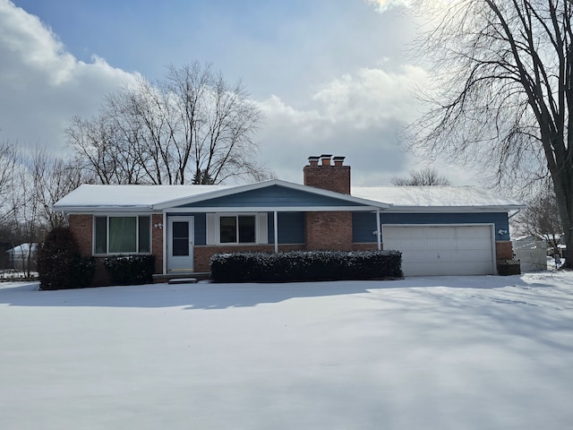 single story home featuring a garage