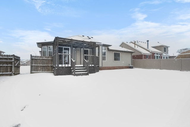 view of snow covered house