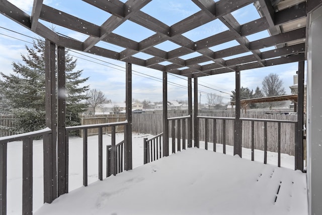 view of snow covered deck