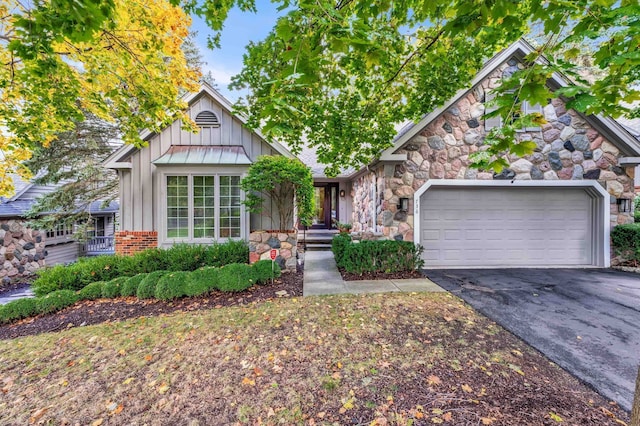 view of front of property with a garage