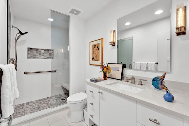 bathroom with walk in shower, vanity, toilet, and tile patterned flooring