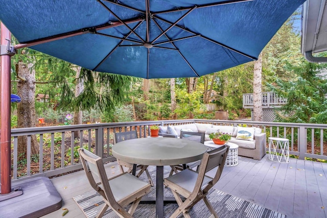 deck with an outdoor hangout area