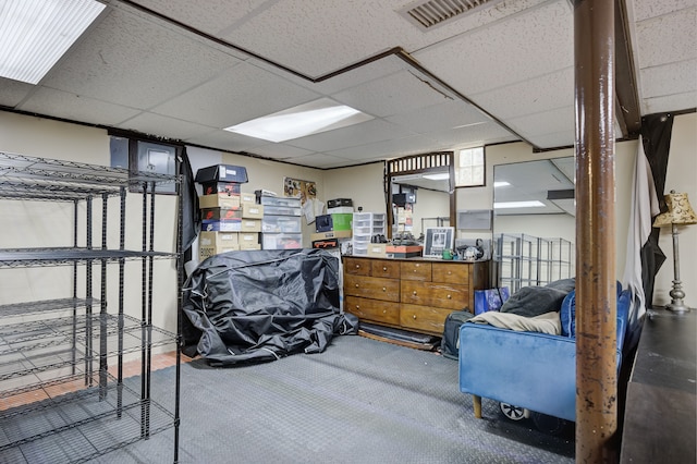 basement with a drop ceiling