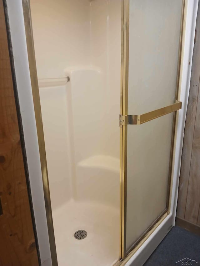 bathroom with an enclosed shower