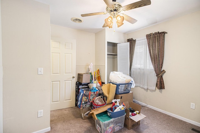 carpeted bedroom featuring ceiling fan