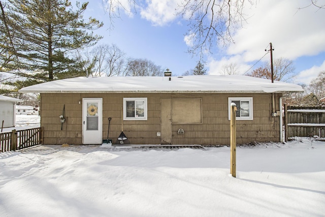 view of snow covered property